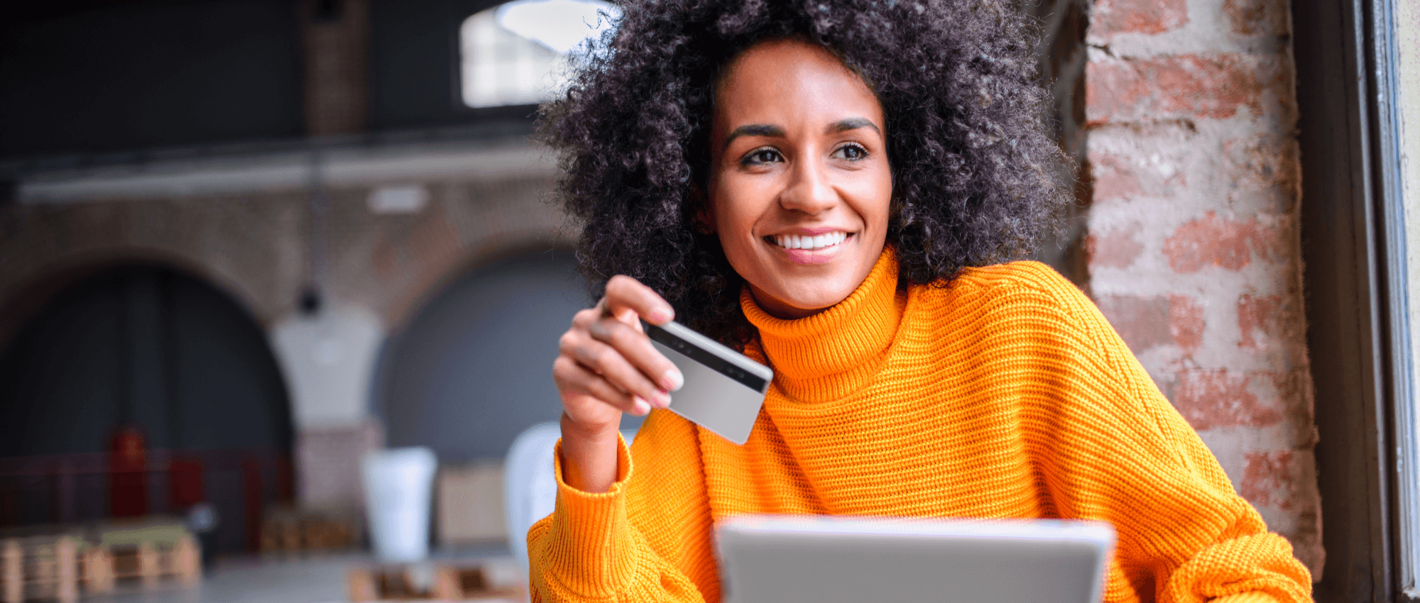 woman with laptop and credit card