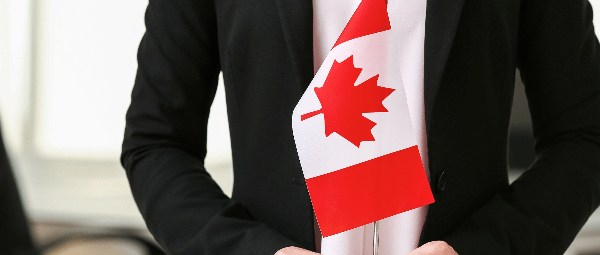 Holding the Canadian Flag