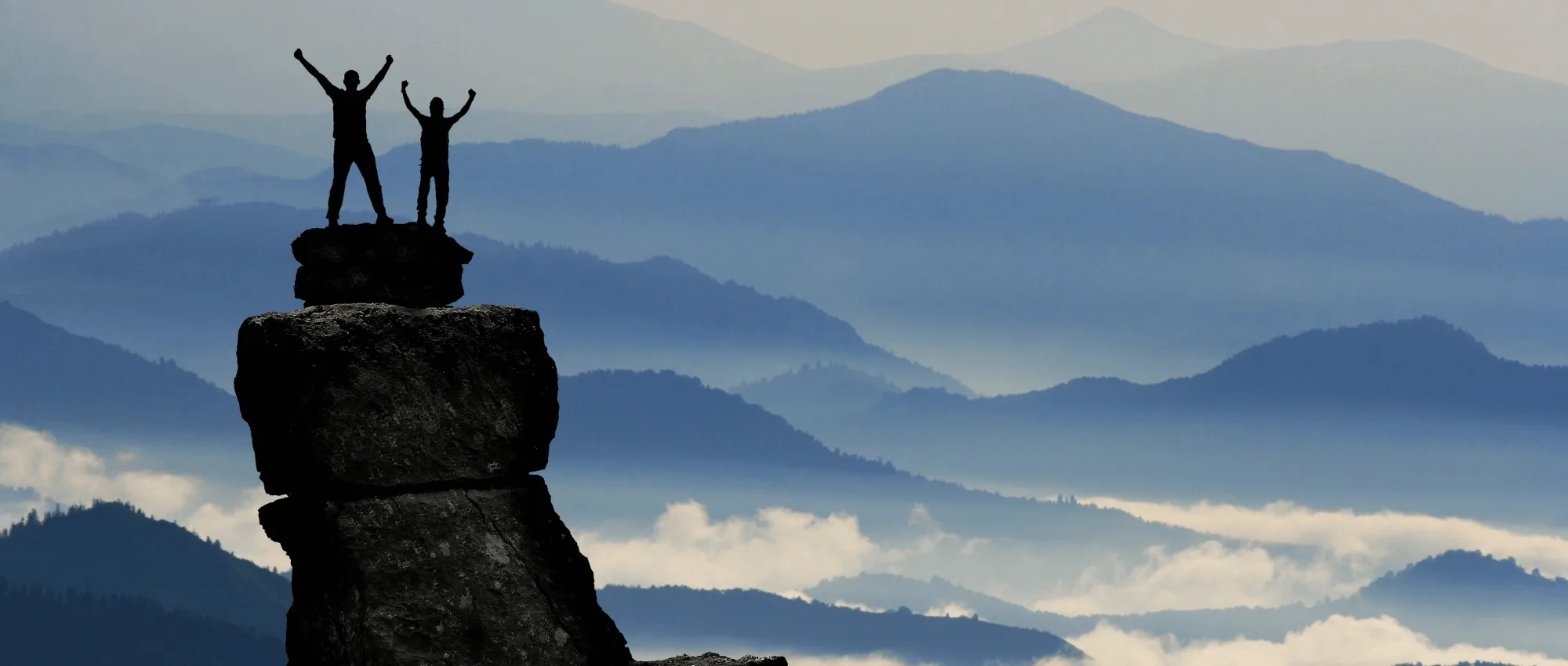 Two men on a cliff