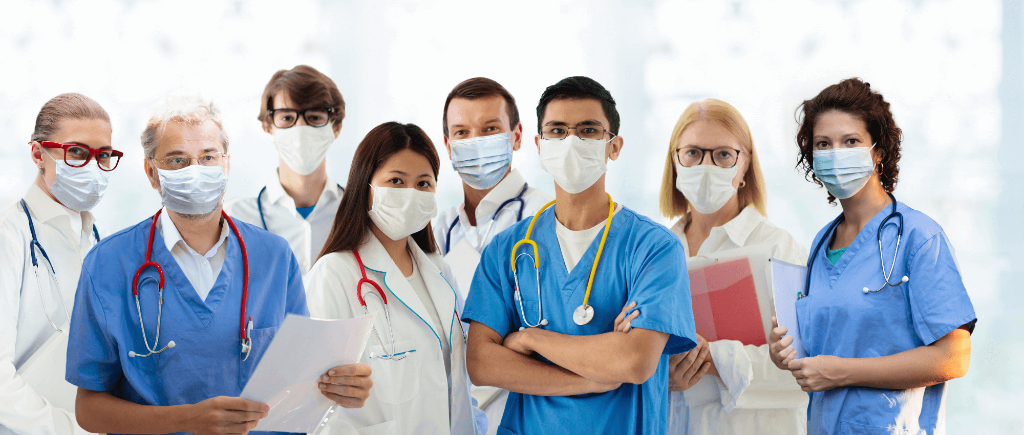 doctors in masks standing in a line