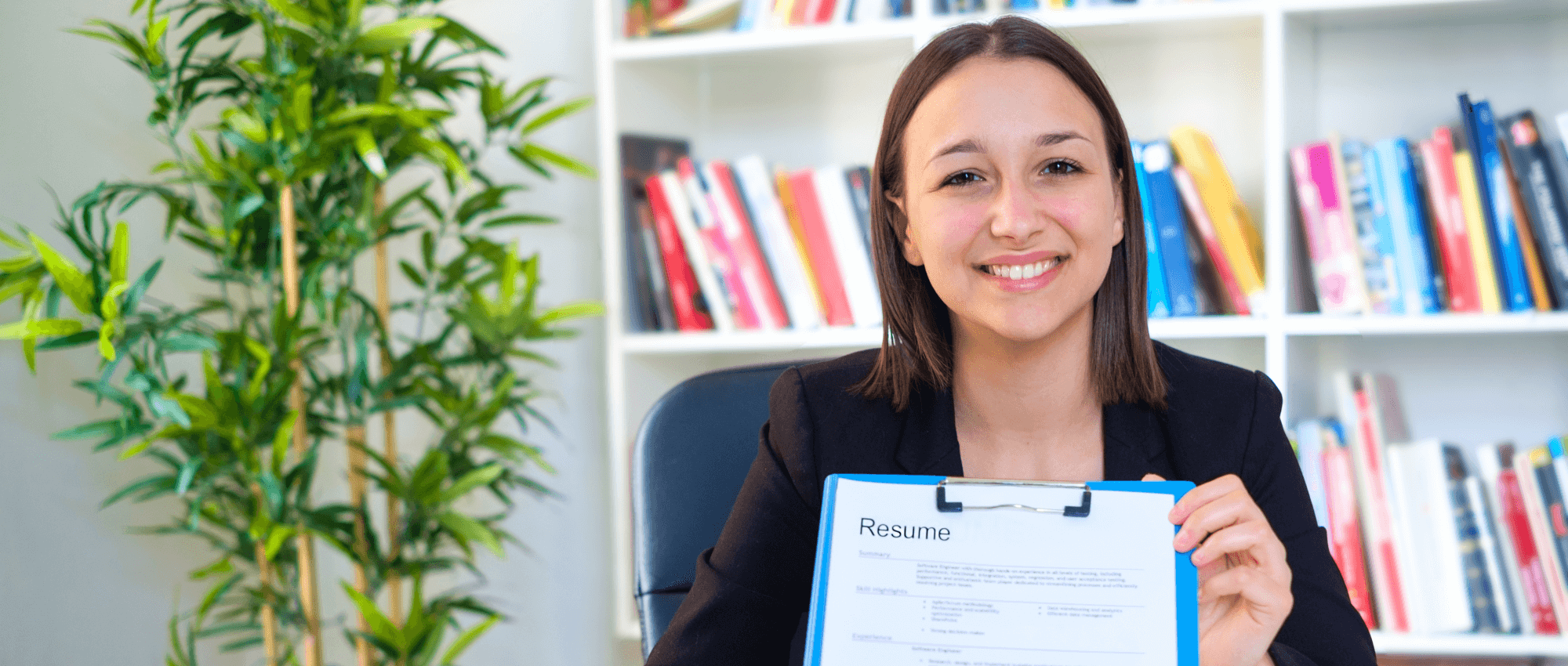 A lady showing a resume template
